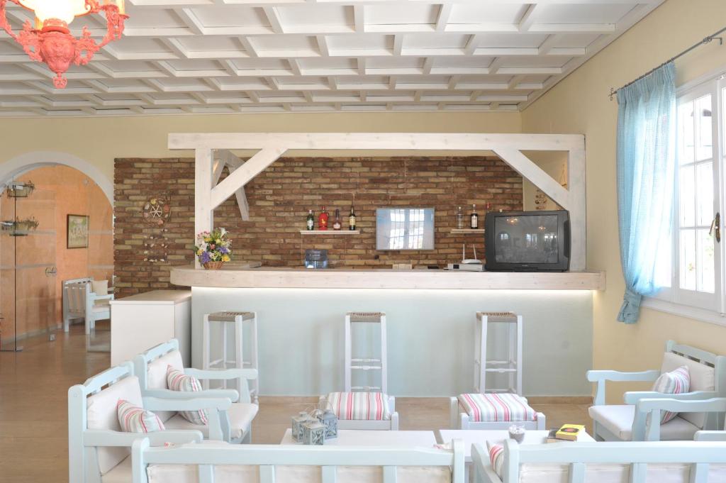 A kitchen or kitchenette at Iliada Beach Hotel