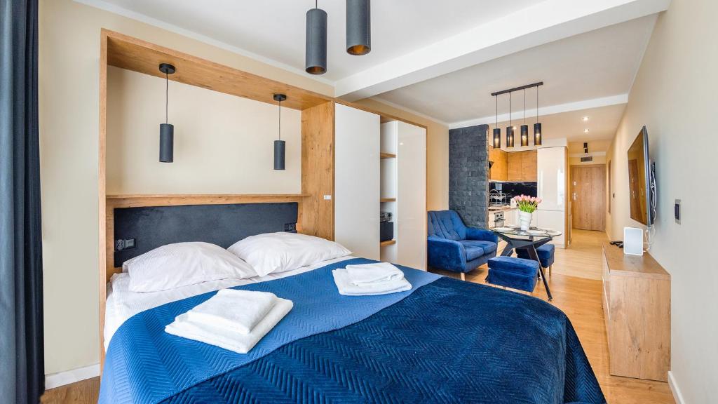Posteľ alebo postele v izbe v ubytovaní Apartamenty Holiday City - Perłowa Przystań