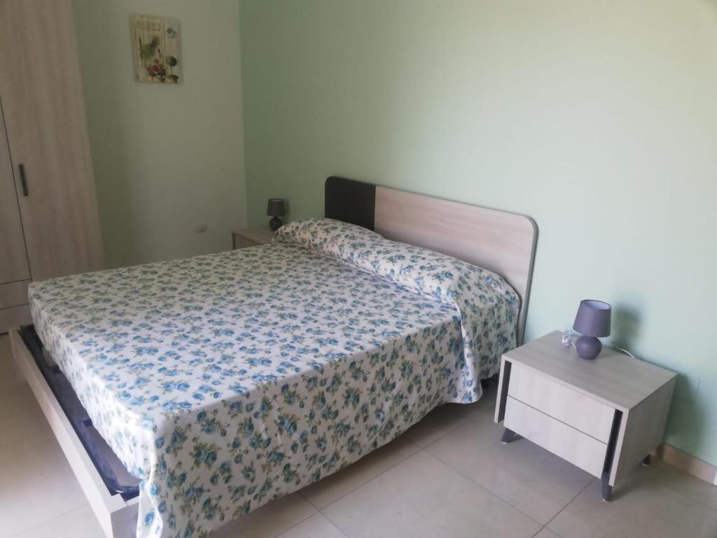 Łóżko lub łóżka w pokoju w obiekcie Villa Maria Cristina d'Amico