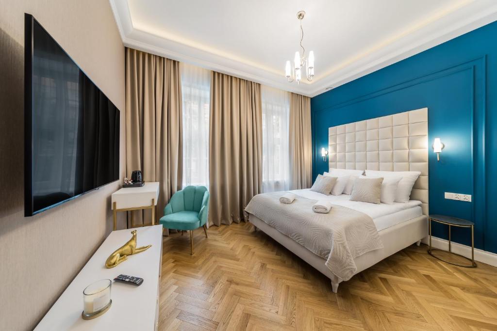 Postel nebo postele na pokoji v ubytování H Aparthotel