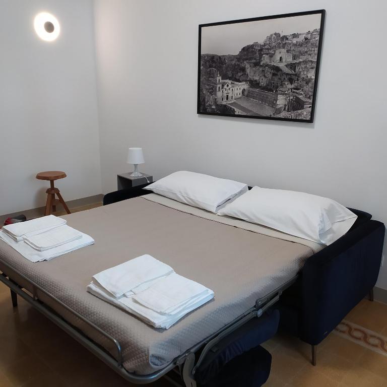 Postel nebo postele na pokoji v ubytování Apartments for you 2