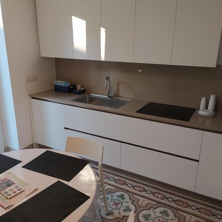 Kuchyň nebo kuchyňský kout v ubytování Apartments for you 2
