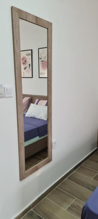 Postel nebo postele na pokoji v ubytování G&G Suites