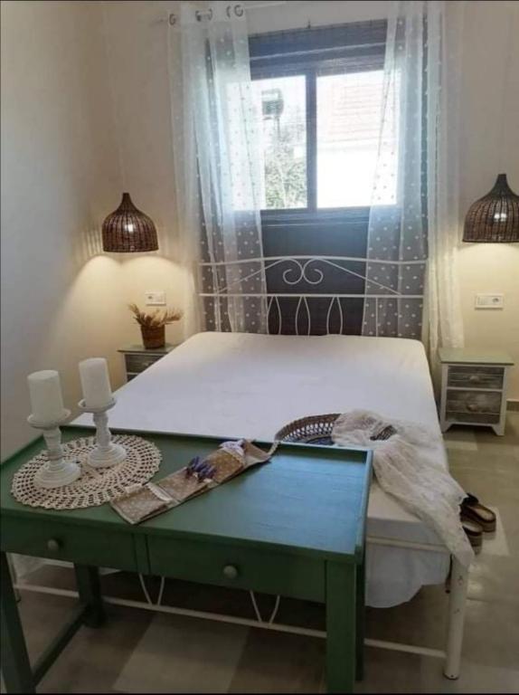 A bed or beds in a room at Boho Vibes