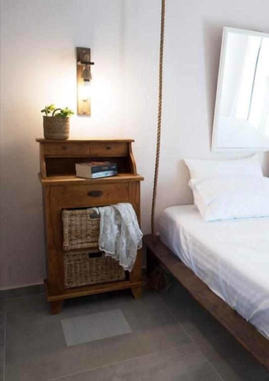 A bed or beds in a room at Boho Vibes