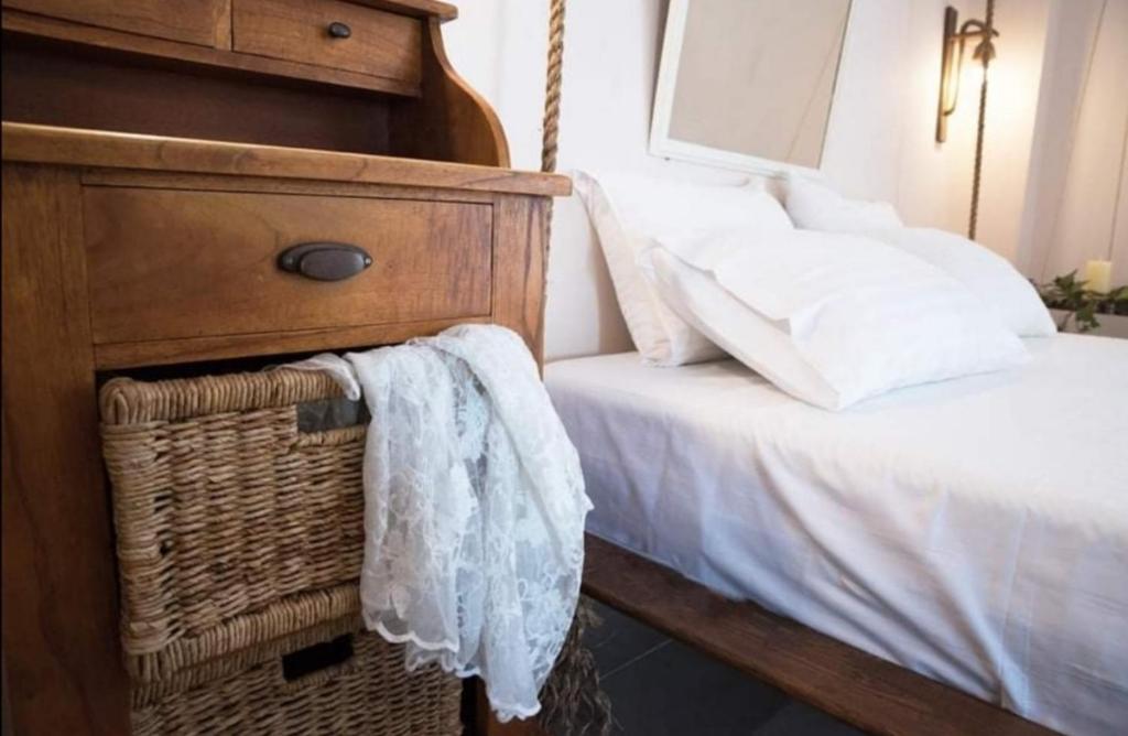 A bed or beds in a room at Boho Vibes