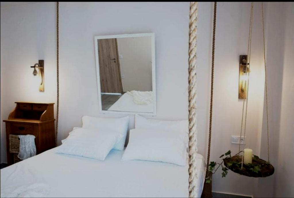 A bed or beds in a room at Boho Vibes