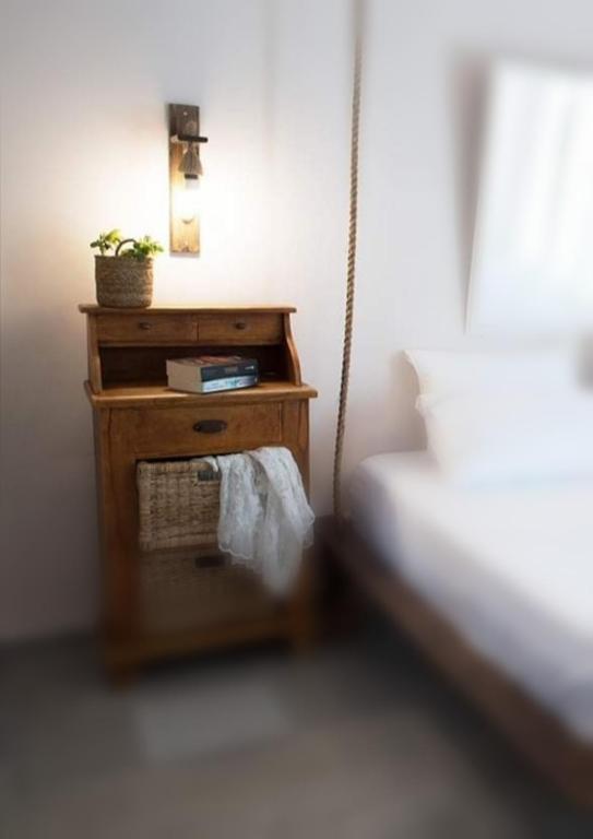 A bed or beds in a room at Boho Vibes