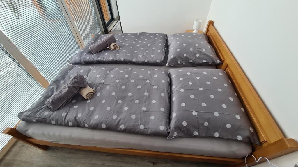 Postel nebo postele na pokoji v ubytování Apartmany Tatrio