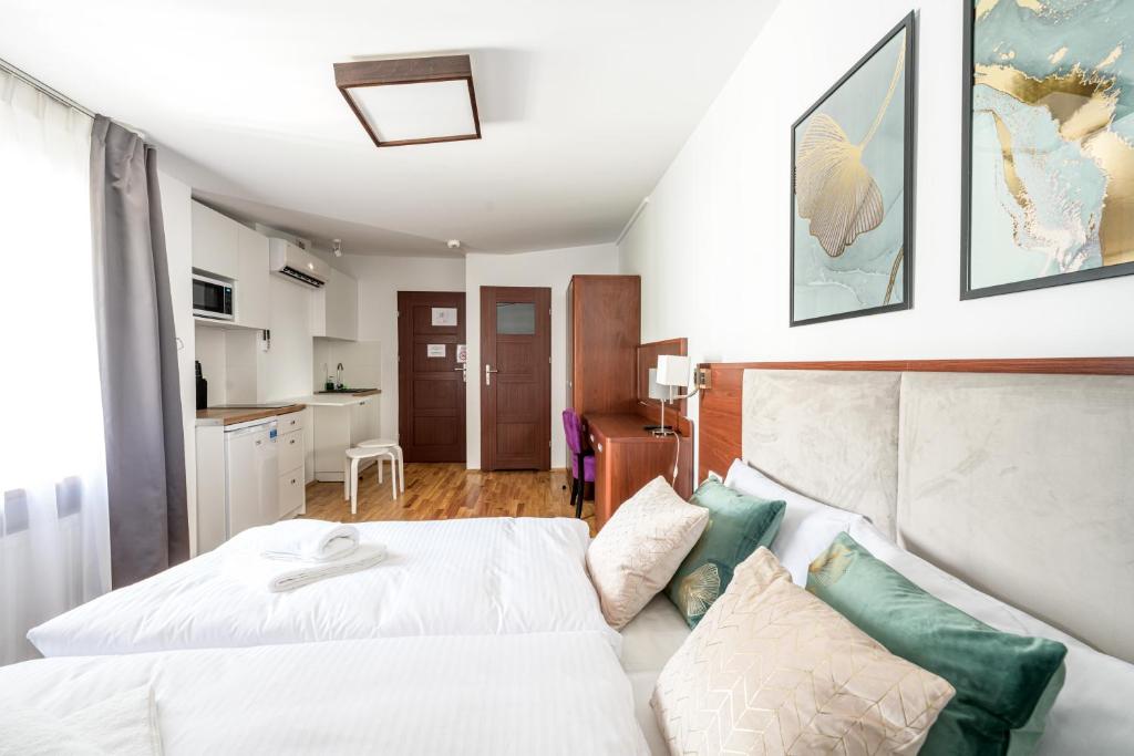 Postel nebo postele na pokoji v ubytování ON/SET APARTHOTEL
