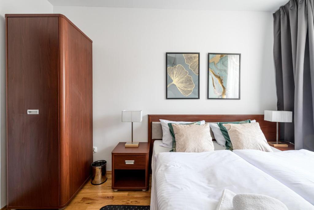 Postel nebo postele na pokoji v ubytování ON/SET APARTHOTEL