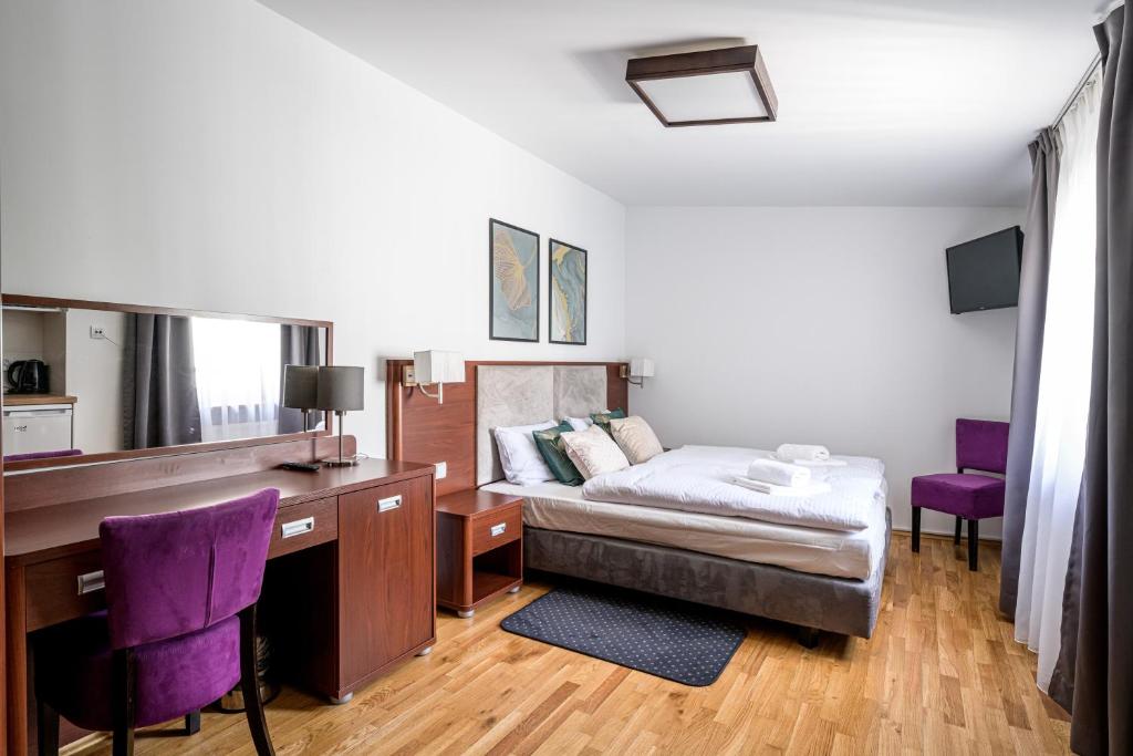 Postel nebo postele na pokoji v ubytování ON/SET APARTHOTEL