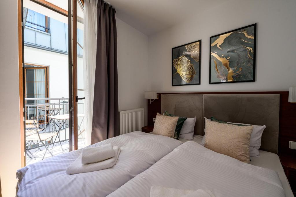 Postel nebo postele na pokoji v ubytování ON/SET APARTHOTEL