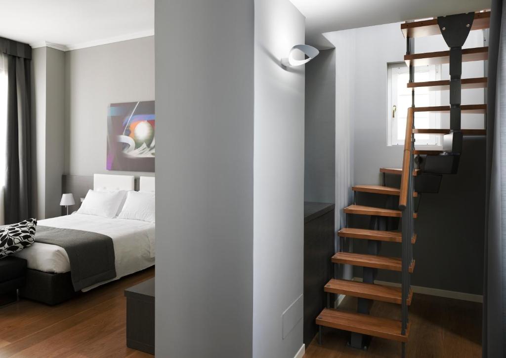 Postel nebo postele na pokoji v ubytování Palace Suite