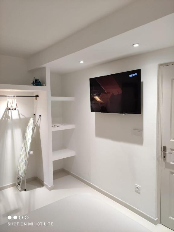 TV a/nebo společenská místnost v ubytování Diamond Paradise