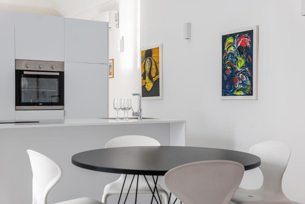 Kuchyňa alebo kuchynka v ubytovaní Suite Bellini 5 Apartment