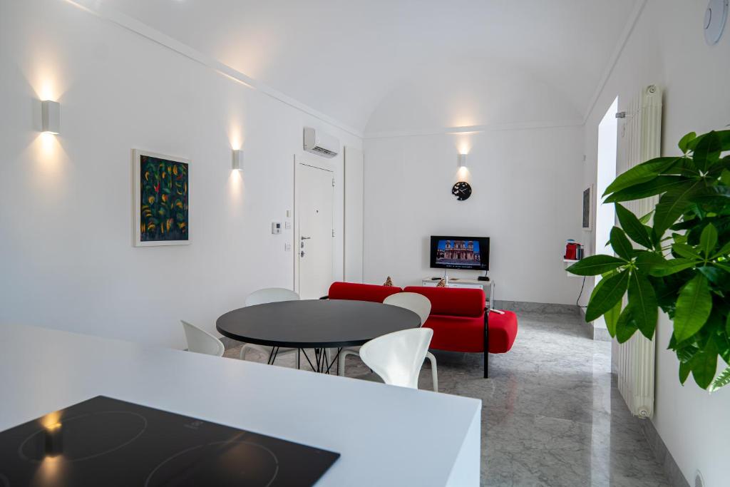 Televízia a/alebo spoločenská miestnosť v ubytovaní Suite Bellini 5 Apartment