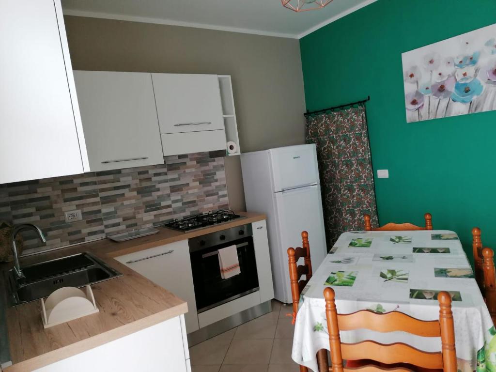Kuchyňa alebo kuchynka v ubytovaní Serenella's House