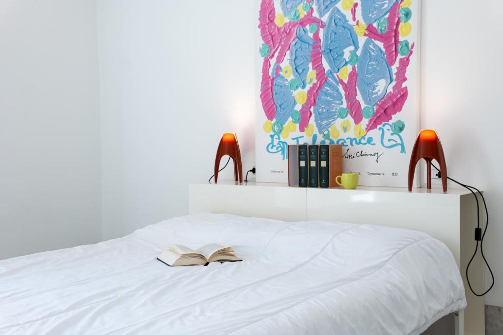 Posteľ alebo postele v izbe v ubytovaní Suite Bellini 5 Apartment