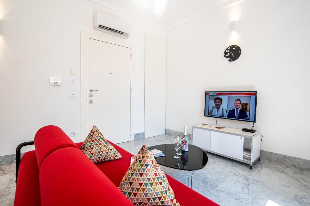 Televízia a/alebo spoločenská miestnosť v ubytovaní Suite Bellini 5 Apartment