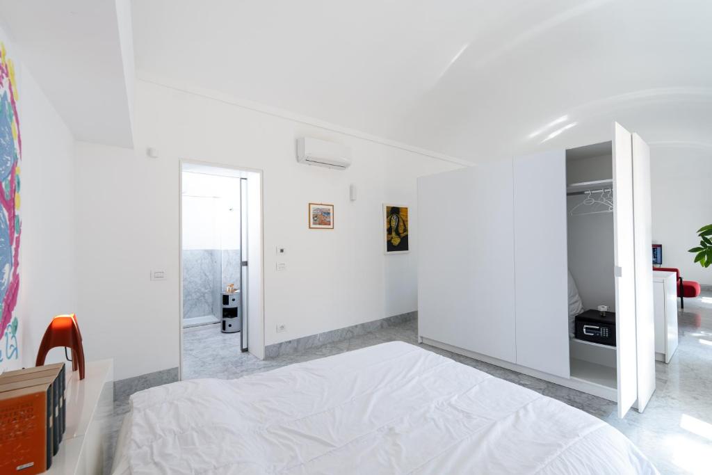 Posteľ alebo postele v izbe v ubytovaní Suite Bellini 5 Apartment