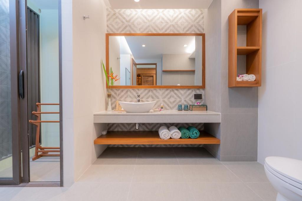 Koupelna v ubytování Khaolak Wanaburee Resort - SHA Extra Plus