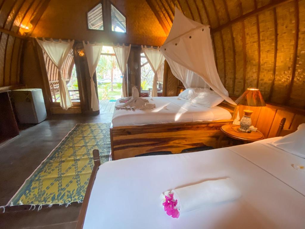 Letto o letti in una camera di Sejuk Cottages