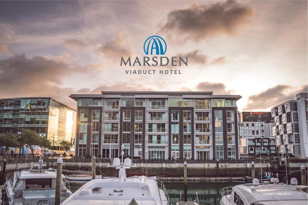 a marriott hotel with boats docked in a harbor at Marsden Viaduct Hotel in Auckland