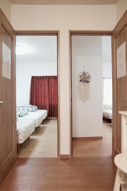 Postel nebo postele na pokoji v ubytování Hachiken Chaya 2F 1-6ppl