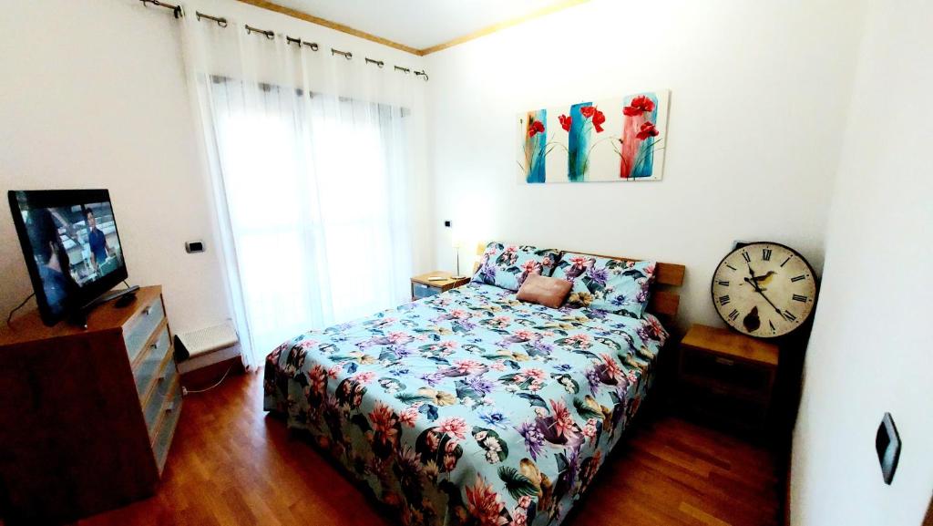 Łóżko lub łóżka w pokoju w obiekcie Home Sorbara "Luxury Home"