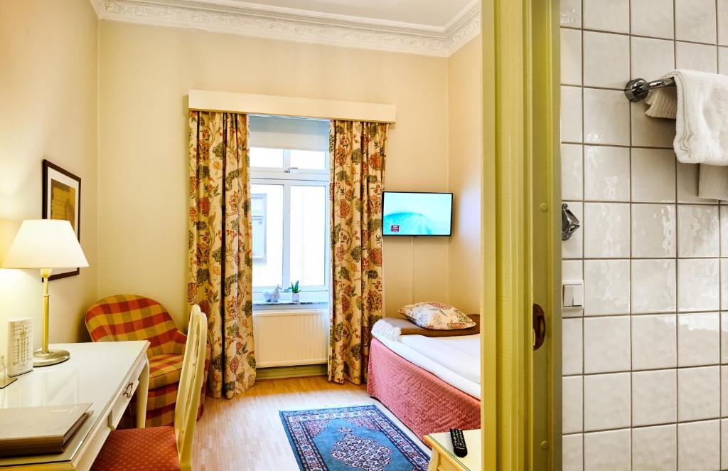 Letto o letti in una camera di Hotel Royal
