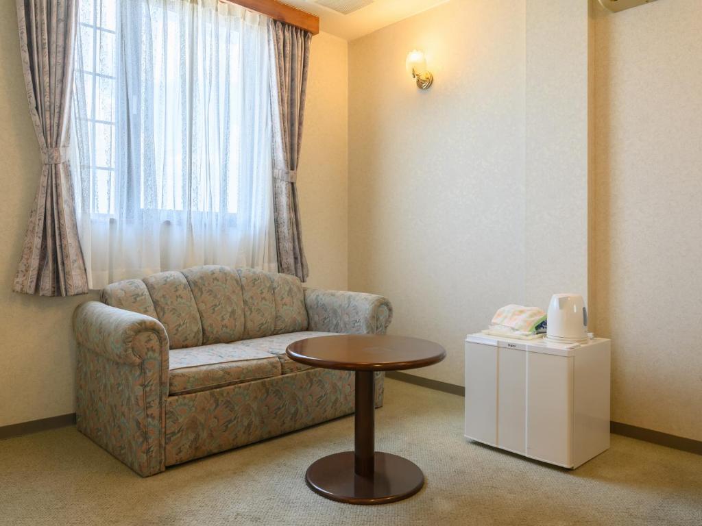 Posezení v ubytování Tabist Station Hotel Isobe Ise-Shima