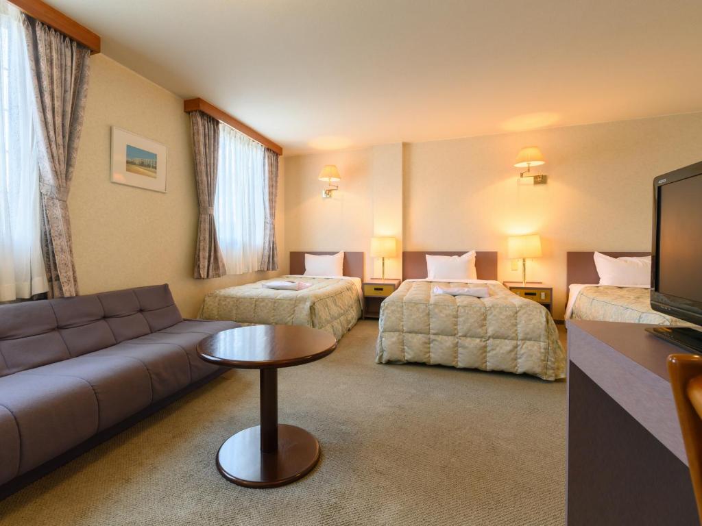 TV a/nebo společenská místnost v ubytování Tabist Station Hotel Isobe Ise-Shima