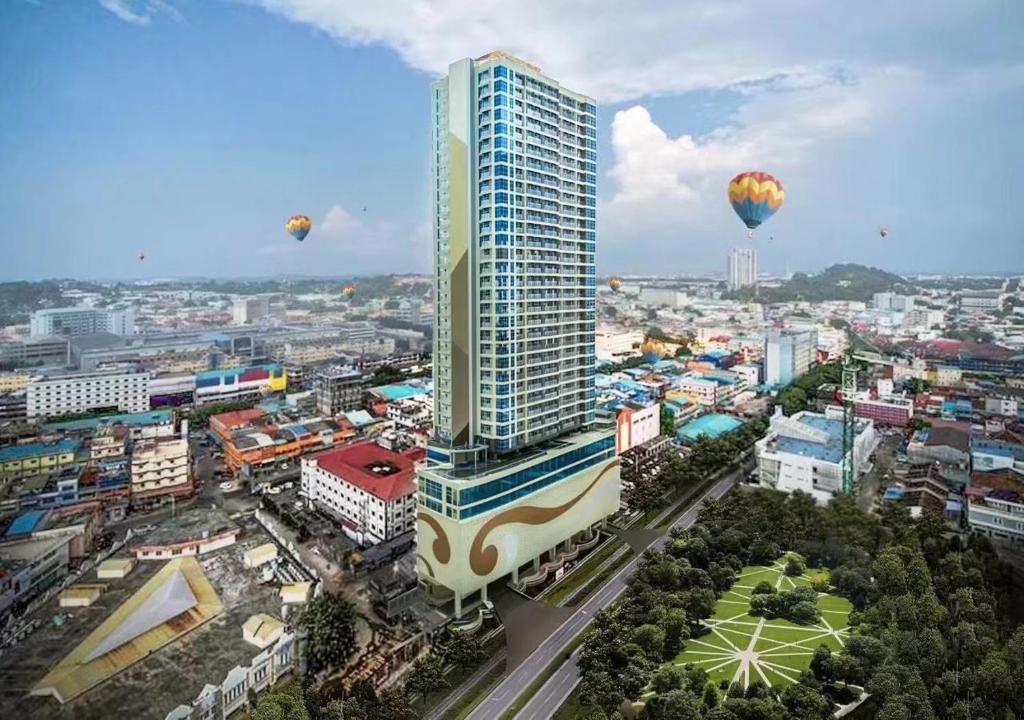 an aerial view of a city with hot air balloons at Apartemen Formosa Residence Nagoya Batam by Wiwi in Nagoya