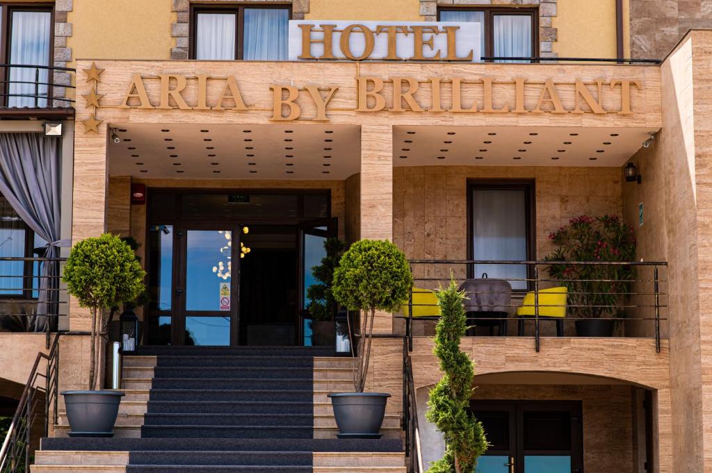 a hotel with a sign that reads arla by britta at Aria by Brilliant in Zalău