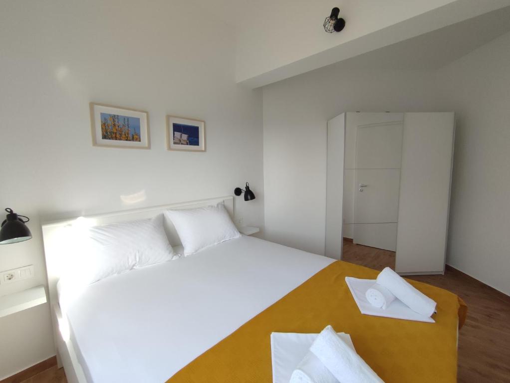 Posteľ alebo postele v izbe v ubytovaní Apartmani V&V - new apartments