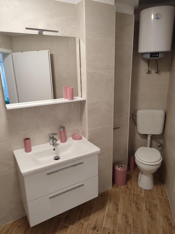 Kúpeľňa v ubytovaní Apartmani V&V - new apartments