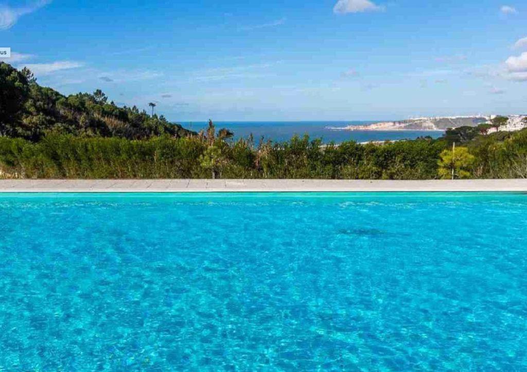 Swimmingpoolen hos eller tæt på Villa with views over the Atlantic Ocean and swimming pool