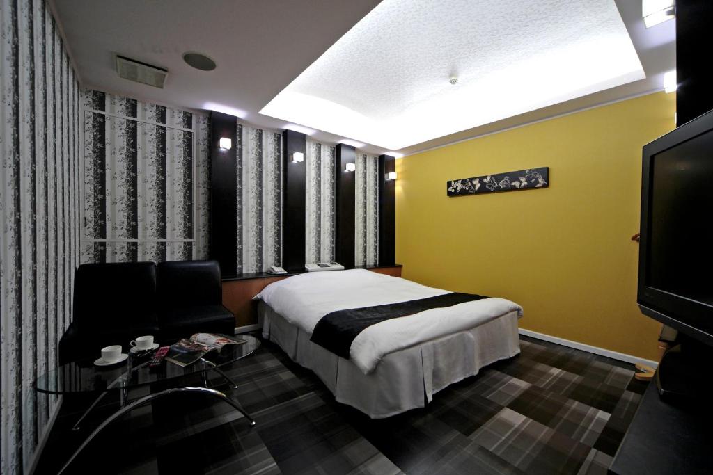 TV a/nebo společenská místnost v ubytování Hotel LALA minato - Adult Only