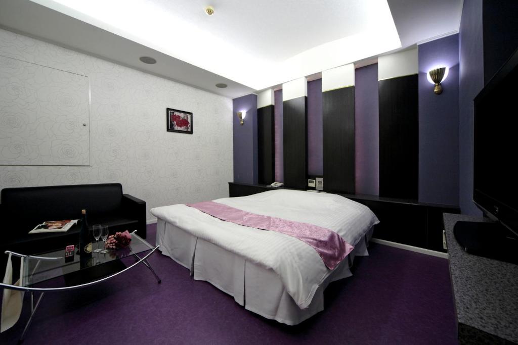 Postel nebo postele na pokoji v ubytování Hotel LALA minato - Adult Only