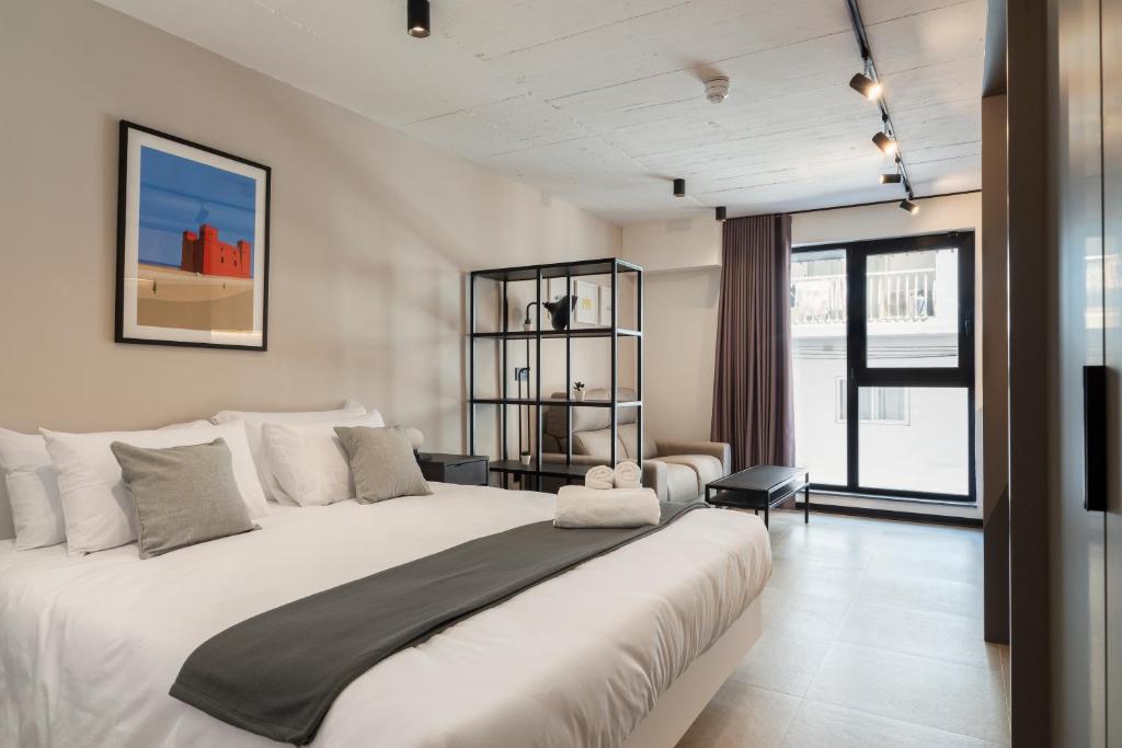 Postel nebo postele na pokoji v ubytování Aparthotel Adagio Malta Central
