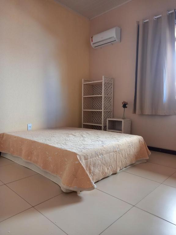 Postel nebo postele na pokoji v ubytování Uma Casa para o Descanso!