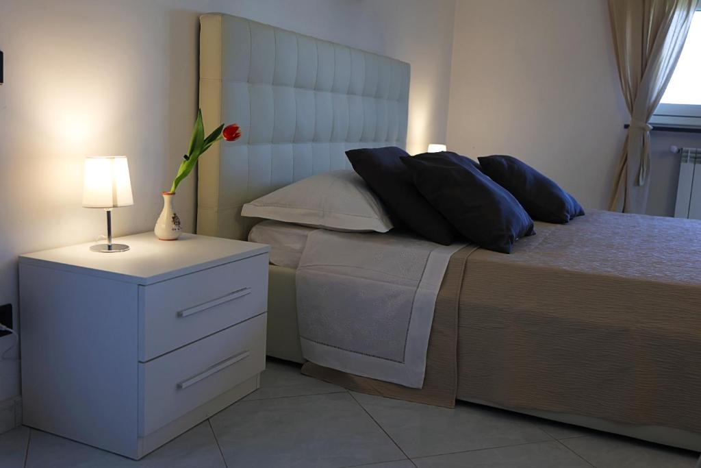 A bed or beds in a room at B&B Privileged