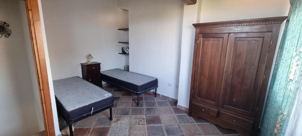 Posteľ alebo postele v izbe v ubytovaní Casa di Gio'