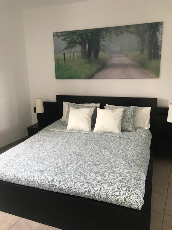 A bed or beds in a room at Casa Dylan
