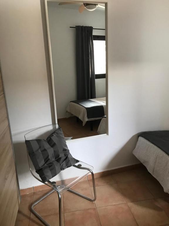 A bed or beds in a room at Casa Dylan