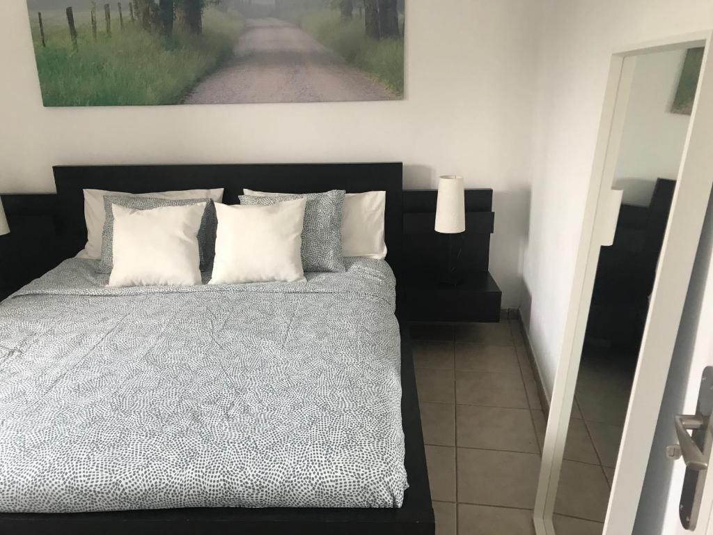 A bed or beds in a room at Casa Dylan