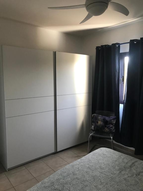 A bed or beds in a room at Casa Dylan