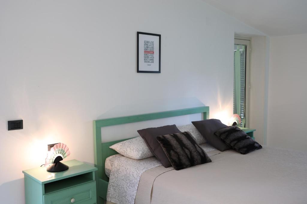 A bed or beds in a room at B&B Privileged