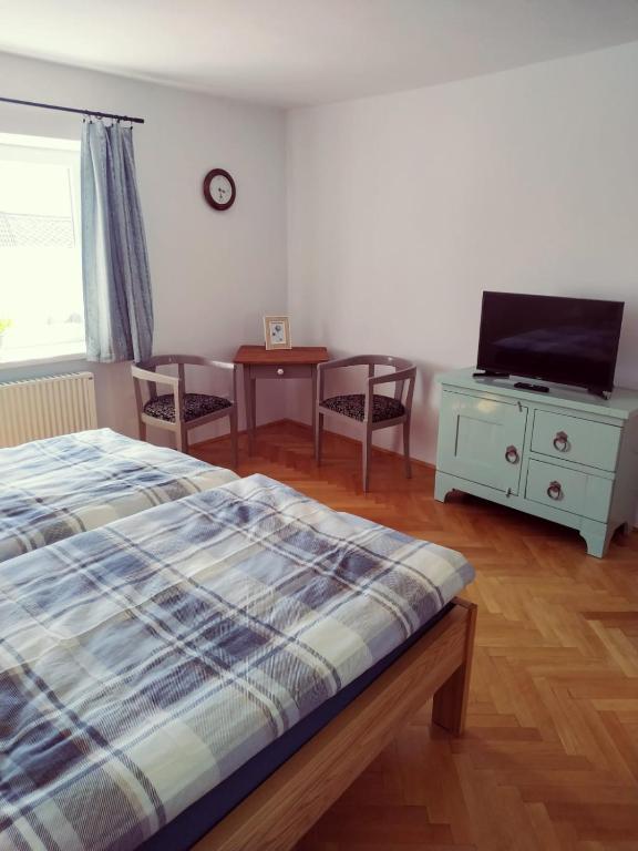 Postel nebo postele na pokoji v ubytování Apartmán Počátky